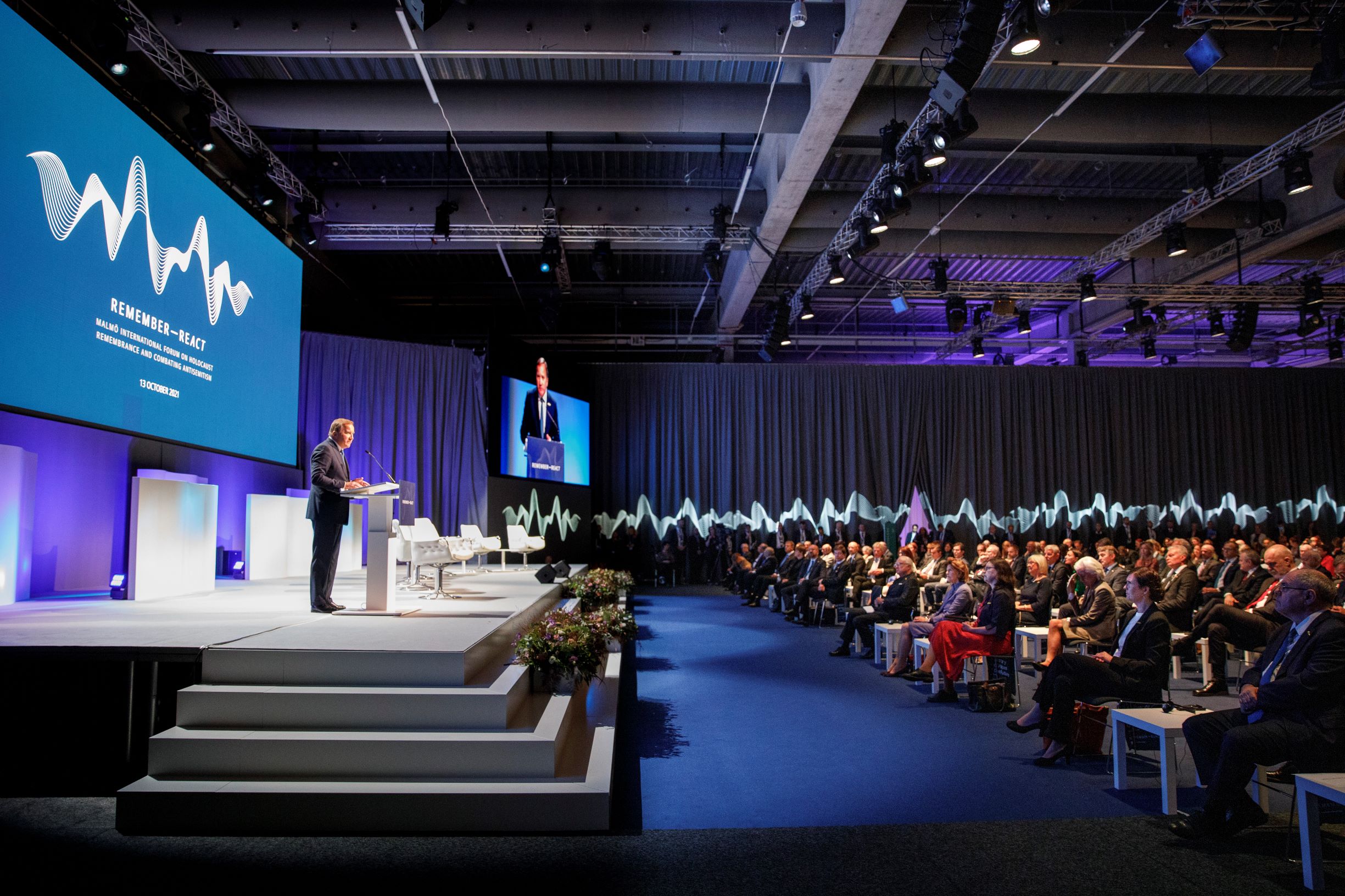Former Prime Minister Stefan Löfven speaks to the audience